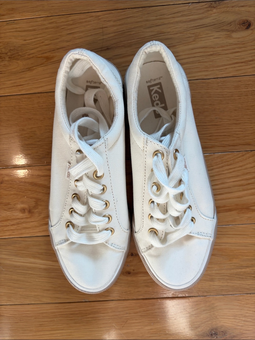 Keds White Canvas Sneakers with Gold Eyelets